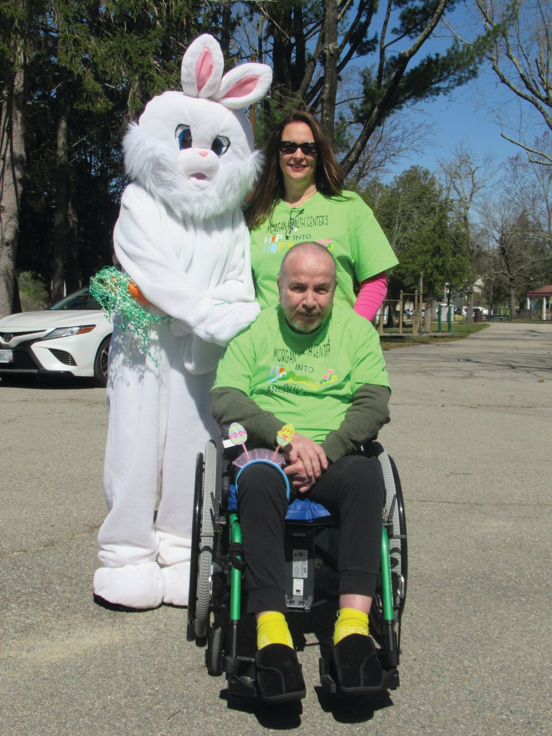 GRAND GREETING: The Easter bunny made sure Frank Garcia and Morgan Health Center staffer Ferreira enjoyed last week’s special Bunny Walk in Johnston.